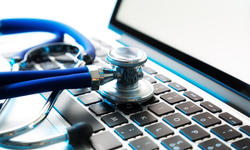 stethoscope on laptop