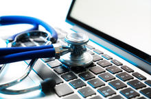 stethoscope on laptop